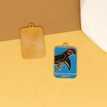 Detailed view of parrot tarot card style enamel pendant featuring Death text and golden back - L / Black Parrot (Death)