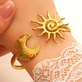 Gold stainless steel asymmetric open bangle with sun and crescent moon design variant - Sun and Moon (12029) / Gold