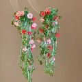 Close-up of summer forest style glass bead fringe earrings with floral leaf design - 1# Woven Flower Tassel Style / Pink Green Red