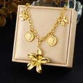 Collier en acier inoxydable doré avec pendentif fleur et breloques de pièces vintage - Collier Pendentif Grande Fleur Nœud Pièce Vintage (N4129)