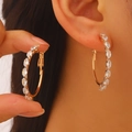 Golden round hoop earrings with marquise-cut clear zircon stones for women - Marquise Zirconia Hoop (2942) / Gold