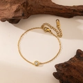 Minimalistisches goldenes Edelstahl-Armband mit einem runden klaren Kristallstein - Einzelnes Edelstein Armband (Gold)