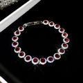 Elegantes Silberarmband mit funkelnden runden roten Zirkonen in Vintage-Fassung. - Rotes Zirkonia Halo Pave Armband (32#) / Silber