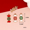 Detailed macro view of enamel candy charms with size 22mm x 8.5mm and weight 1g - Swirl Candy / Red and Green