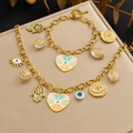 Gold-plated charm bracelet set featuring evil eye and Hamsa hand pendants - B2080+N4140 2-Piece Set
