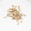 Tiny white enamel star charms with golden alloy plating for DIY jewelry and crafts - White Star