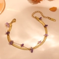 Detailed shot of double-layer gold stainless steel anklet featuring purple amethyst chips - Double Layer Bracelet (Amethyst) / Gold