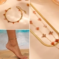 Elegant double-layer gold anklet with red crystal stone and flat snake chain detail - Necklace-Bracelet-Anklet Set (Red Crystal) / Gold