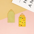 Detail view of lucky Omamori alloy charm showing front enamel and back texture - Wealth and Prosperity(3) / Bright Yellow