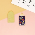 Detail view of lucky Omamori alloy pendant with enamel dripping and gold-toned back - Everything Goes Well (4) / Dark Blue