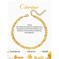 Detailed view of 4mm citrine beaded bracelet with gold heart charm on display card - Citrine Bracelet