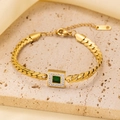 Detail view of gold-plated bracelet with square emerald green stone and zircon inlay - Gold Green Zirconia Bracelet
