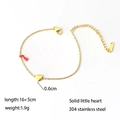 Minimalist gold stainless steel bracelet featuring a mini solid heart pendant on white background - Heart Red String (QYE2242)