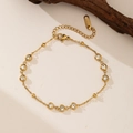 Minimalist titanium steel gold bracelet with sparkling clear round zircon accents - Nine Zirconia Bracelet (QYE2033) / Gold