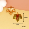 Detail view of maple leaf charms with dimensions 28x29mm and weight 2.8g - Green Maple Leaf