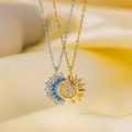 Macro view of magnetic sun and moon necklaces with inlaid crystals on silk background - Sun and Moon Necklace (8859) / Multicolor