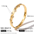 Gold stainless steel bangle with heart-shaped zircon details and dimensions - Dotted Heart Style (NB-B6413)