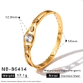 Gold stainless steel hollow bangle with waterdrop zircon inlays, 59mm diameter. - Hollow Geometric Oval Style (NB-B6414)