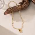Minimalist gold OT buckle necklace with oval paperclip chain on a wooden base - Oval OT Clasp (H1330) Gold