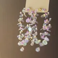 Close-up of iridescent sequin tassel earrings with colorful beads and crystal drops - Iridescent Sequin Tassel Style