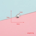 Macro view of small stainless steel apple charm with 7mm and 6mm dimensions - Apple Style (8#) / 50 Pieces