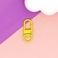 Close-up of vibrant yellow zinc alloy swivel lobster clasp for DIY accessories - Yellow
