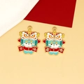 Close-up of traditional dancing lion enamel charms with festive red and gold accents. - Safety and Joy Dragon Style / 10 Pieces Pack