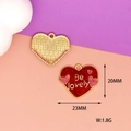Close-up of red glitter heart pendant with Be Lovely text and gold textured back - BE lovely Heart (L-037) / Red
