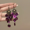 Detailed view of elegant purple shell tassel earrings with vintage bronze metalwork. - Ear Hook (10#) / Purple