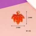 Detail view of orange maple leaf enamel charm with 21x22mm dimensions and 1.4g weight - Thanksgiving Maple Leaves