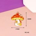 Macro view of a mushroom enamel pendant with 30mm height and 27mm width dimensions. - Mushroom House