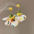 Detailed view of fashionable yellow resin flower drop earrings with fruit print petals - Fruit Print Petal Style (10#) / Steel Earring Post / Yellow