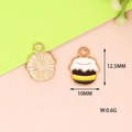Detail view of enamel bee honey pot charm showing 12.5x10mm size and textured gold back - 2 Honey Pot / 10 Pieces Pack