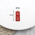 Red rectangular enamel charm with gold trim and 'Riches' text for DIY jewelry making - Get Rich