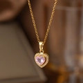 Macro shot of pink heart gemstone pendant with gold plating and zircon setting - Pink Zirconia Heart (9094)