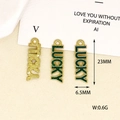 Detail view of 23mm vertical Lucky letter charms in green enamel and gold finish - LUCKY Style (1) / Glitter Green