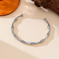 Adjustable silver knot cuff bracelet in bamboo style finish with 18K white gold plating - Open Bamboo Style (QYE227) / Steel