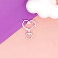 Close-up view of a pink heart-shaped lobster clasp for DIY jewelry and keychain making - Light Pink