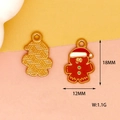Detailed macro view of Christmas gingerbread man alloy charms with 18mm size markings - Christmas Gingerbread Man