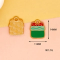 Close-up of green gift box Christmas charm with 14mm height and 11mm width measurements - Green Christmas Gift