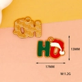 Detailed view of Christmas 'HO' enamel pendant with 17x13mm dimensions and 1.2g weight - Christmas Hat HO