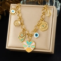 Gold plated stainless steel necklace with evil eye and heart charms on display box - N4140