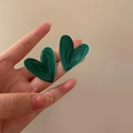 Detail shot of heart-shaped earrings with dark green marble enamel and gold trim - Heart Earrings (11#)