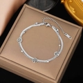 Elegante pulsera plateada de doble capa con dijes de árbol de la vida y cuentas pulidas - Pulsera de Doble Capa con Árbol de la Vida Hueco (E2012) / Color acero