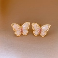 Close-up of butterfly stud earrings with pink crystal center and white enamel wings - 54# Gold Butterfly White Wavy Pink Gemstone