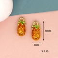 Close-up of mini pineapple enamel charms with 14mm height and 6mm width measurements. - Pineapple Style