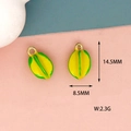 Detail of yellow carambola enamel charms showing dimensions 14.5mm by 8.5mm and weight 2.3g - Starfruit Style