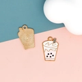 Vista dettagliata di ciondoli smaltati fai-da-te per bubble tea, fronte e retro - 20 Tè al Latte Originale