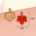 Detailed macro view showing 25mm by 20mm dimensions of red enamel maple leaf pendant. - Maple Leaf / Red