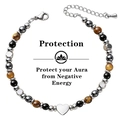 Detail of triple protection bracelet with tiger eye and obsidian beads and heart charm - Classic Protection Style